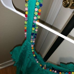 Boutique green dress with colorful ball detail